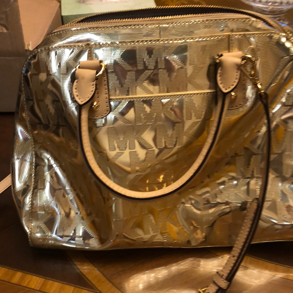 New without tags, Michael Kors gold satchel.